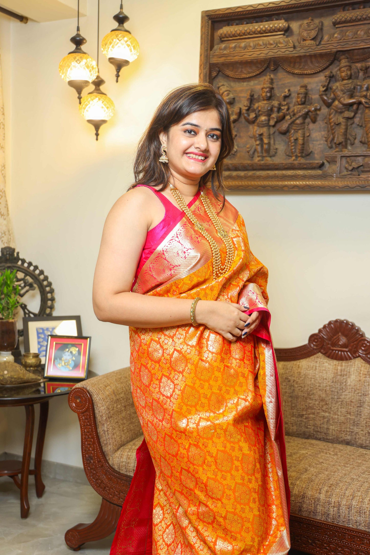 Side View of Pure Banarasi silk saree in vibrant orange