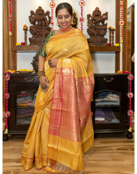 Red & Yellow Tussar Saree with subtle Zari Buttis