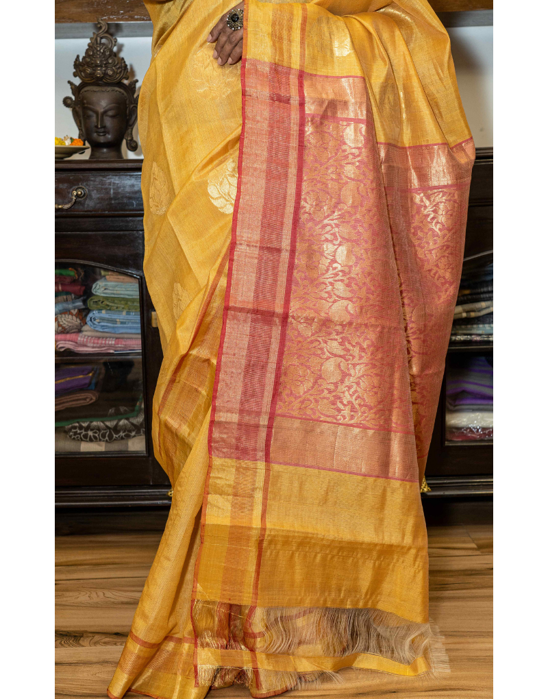 Red & Yellow Tussar Saree with subtle Zari Buttis