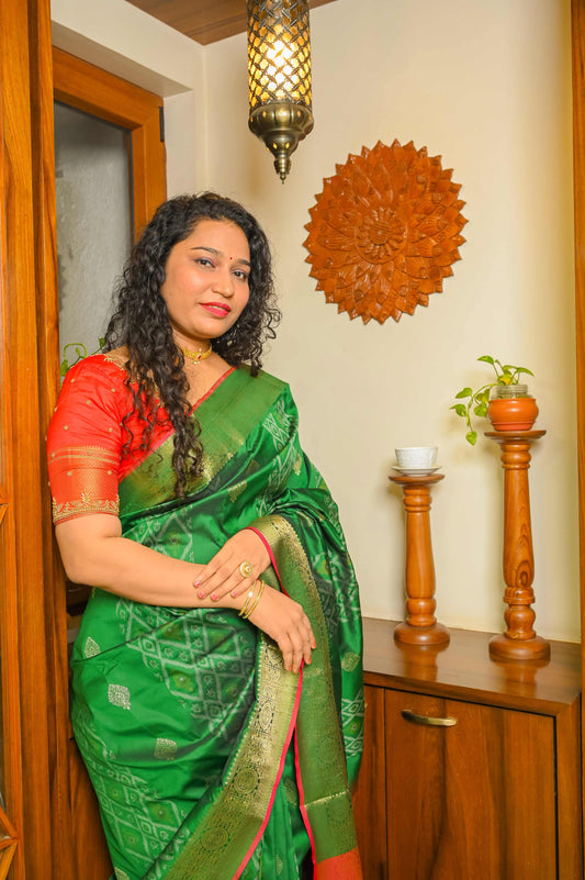 Burnt Red and Green Patola Silk Saree