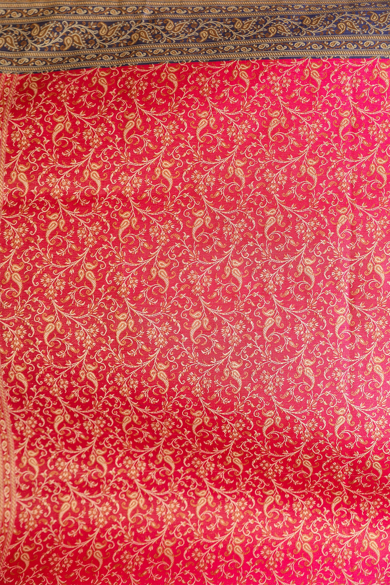 Detailed view of zari-inspired Jamawar design on pink and blue handloom Banarasi saree – luxury ethnic fashion.