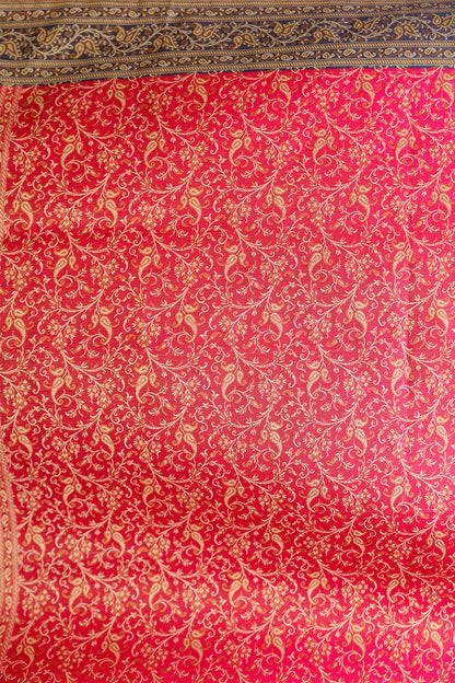 Detailed view of zari-inspired Jamawar design on pink and blue handloom Banarasi saree – luxury ethnic fashion.
