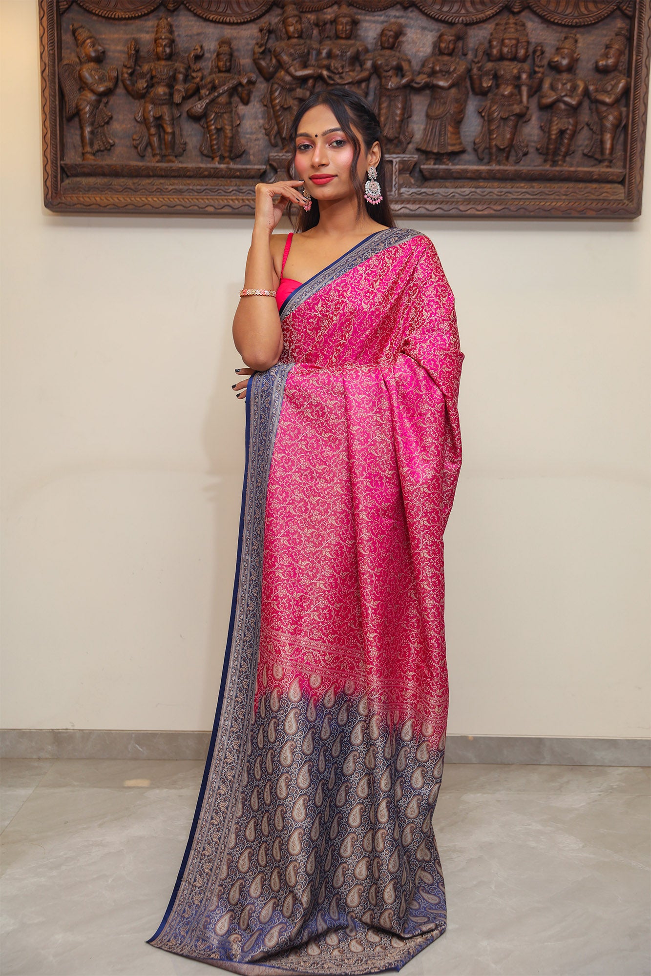 Model draped in exclusive Banarasi saree with resham silk weaving and Tanchoi work – ideal for Indian festivals.