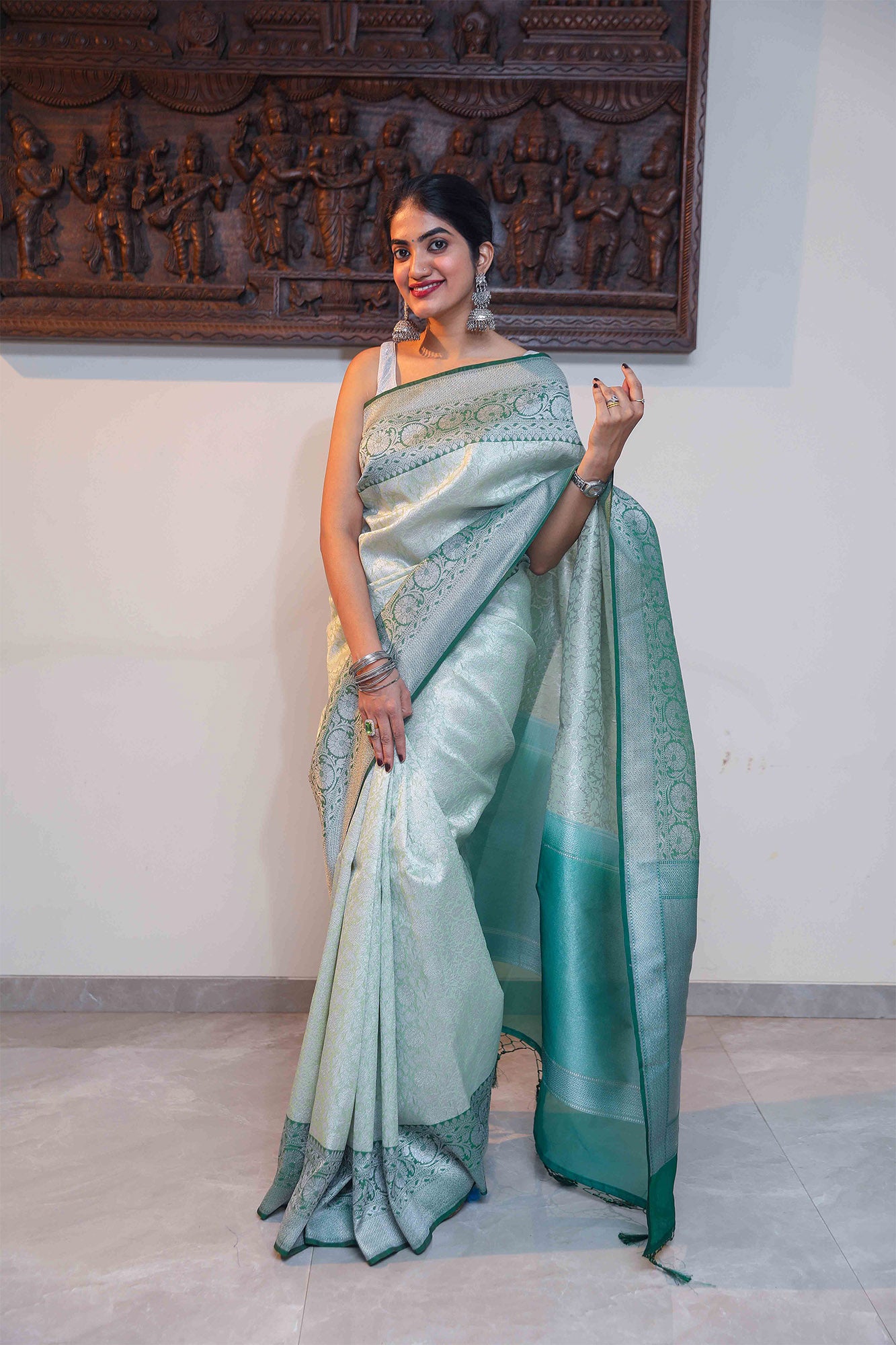 Front view of Pista Green and Dark Green Pashmina Kora Silk Banarasi saree with silver zari jaal – festive Banarasi silk look.